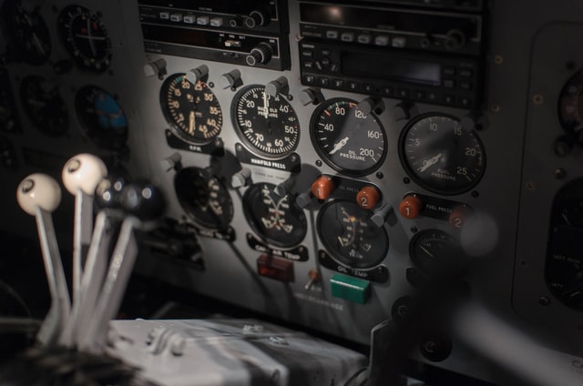 airplane dials in a cockpit